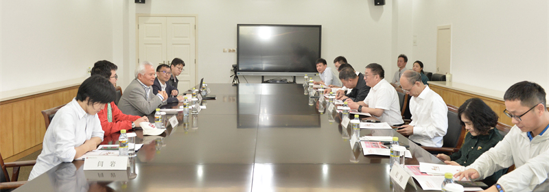 吴士存与新华社副总编任卫东一行座谈交流